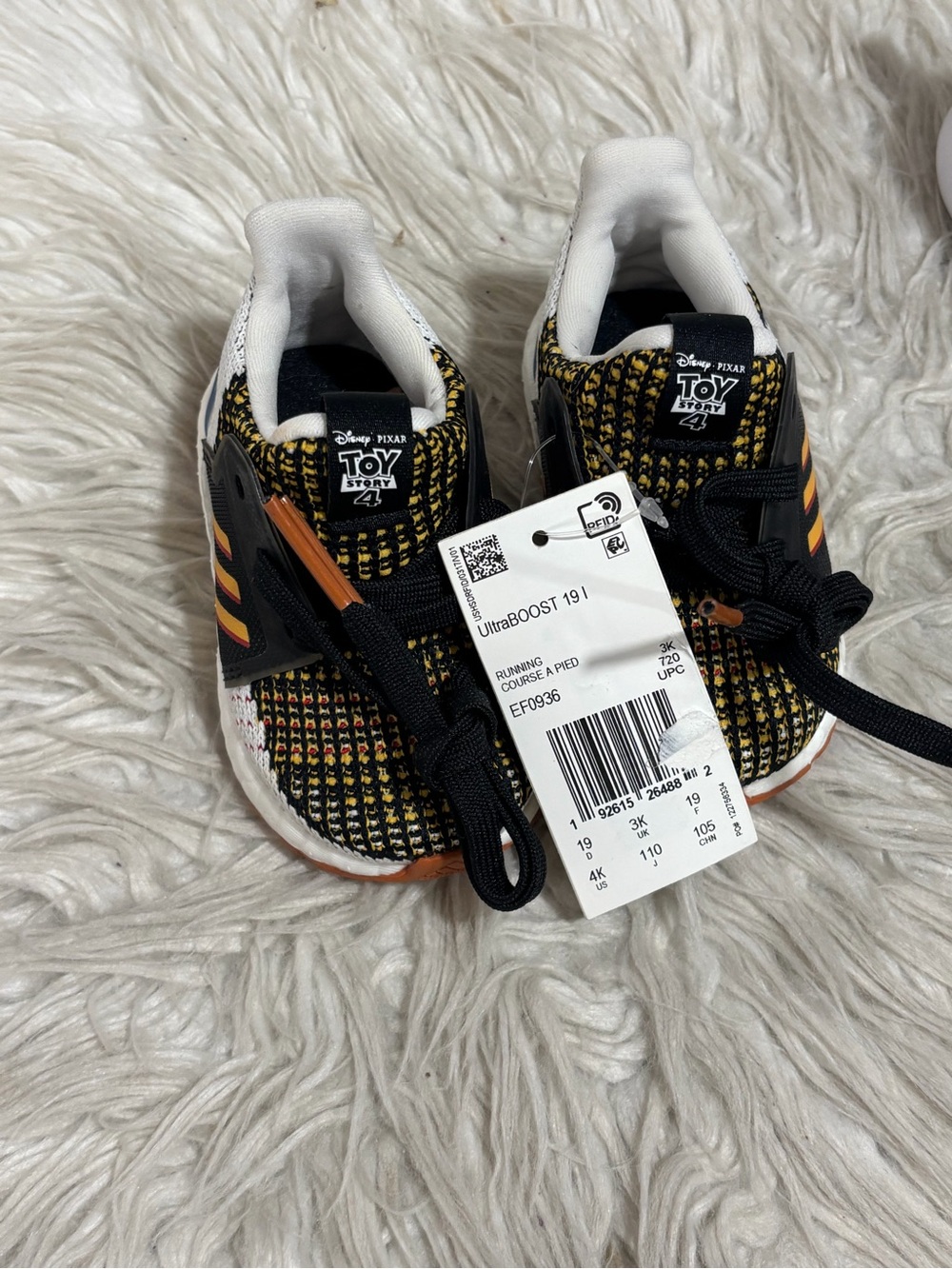 adidas Kids UltraBOOST Sneakers in Black and Orange
